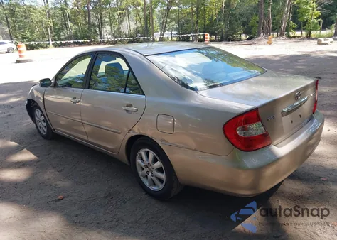 2003 Toyota Camry Xle z USA, uszkodzony, nr VIN JTDBE30K730164346